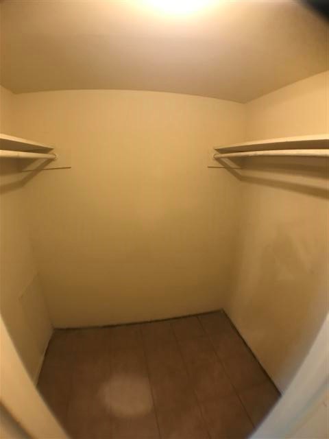 2610 Salado Street, Unit 105 Austin, TX 78705 - Photo 10 of 11 a view of small space with racks on the wall