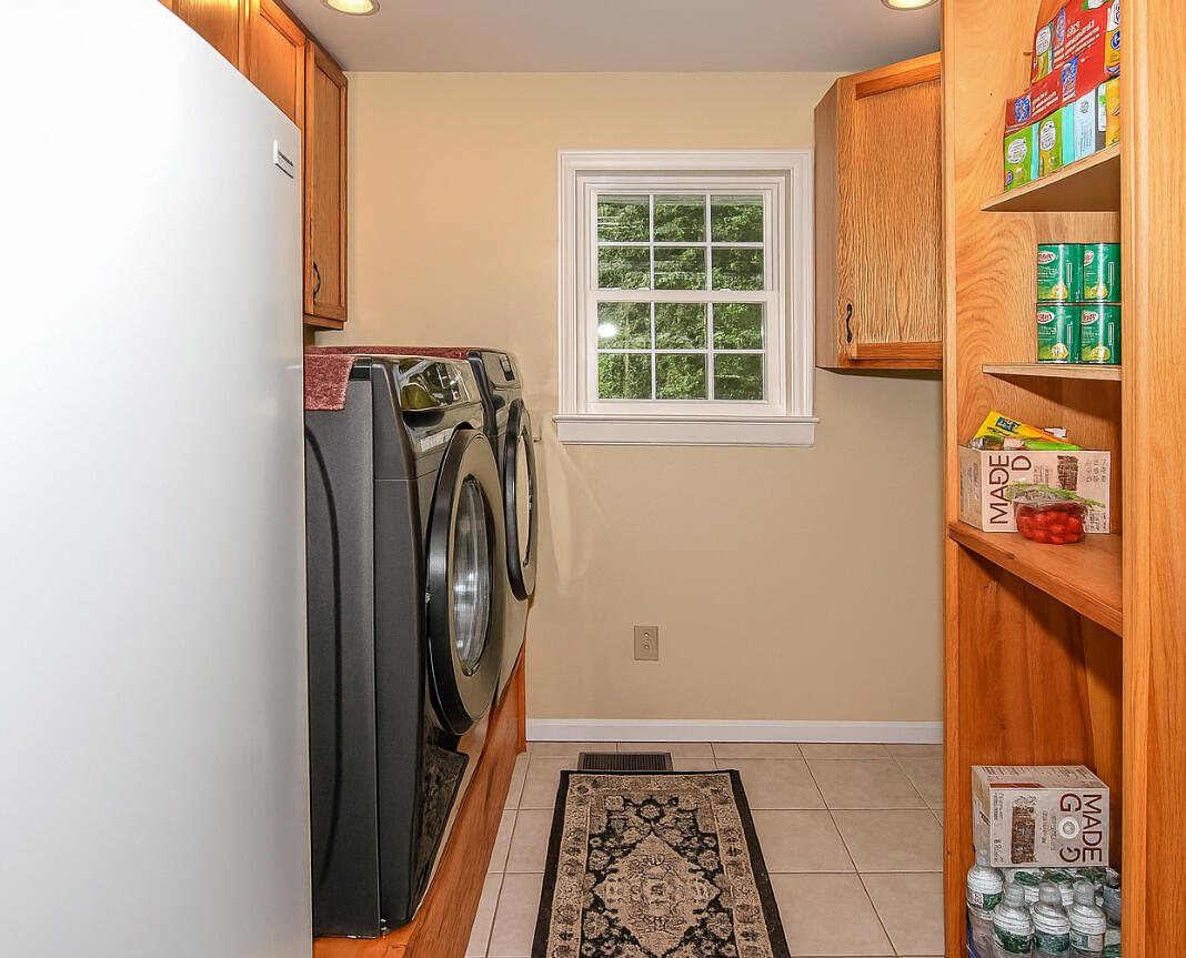 111 Edes Falls Road Harrison, ME 04040 - Photo 9 of 51 Laundry room with freezer and storage