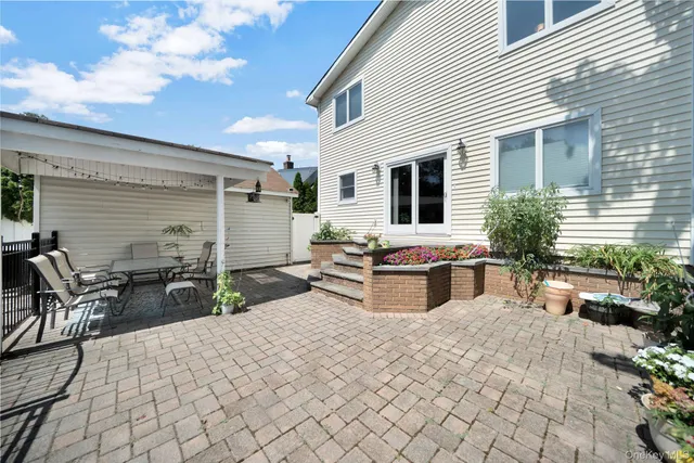 a view of a dinning table and chair in the patio
