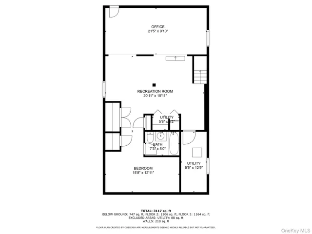 a picture of a bench in front of a wall