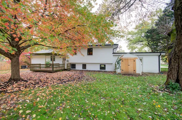 a backyard of a house with lots of green space