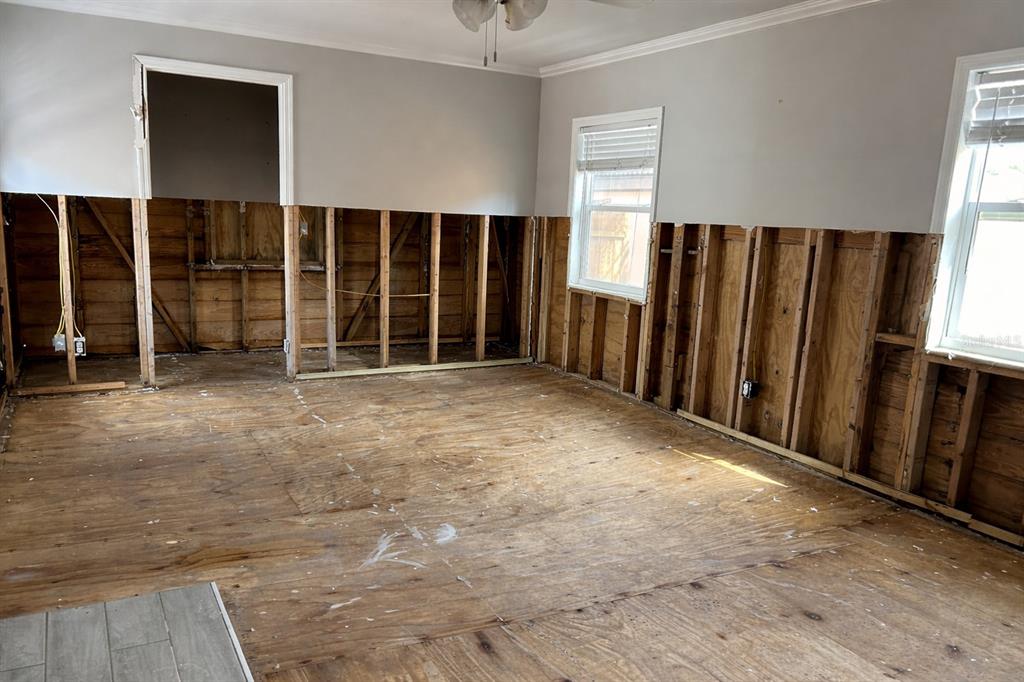 14033 Palm Street Madeira Beach, FL 33708 - Photo 16 of 41 a view of an empty room with a window