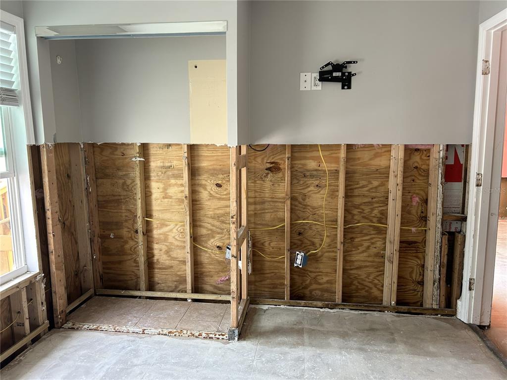 14033 Palm Street Madeira Beach, FL 33708 - Photo 20 of 41 a view of a bathroom with a shower