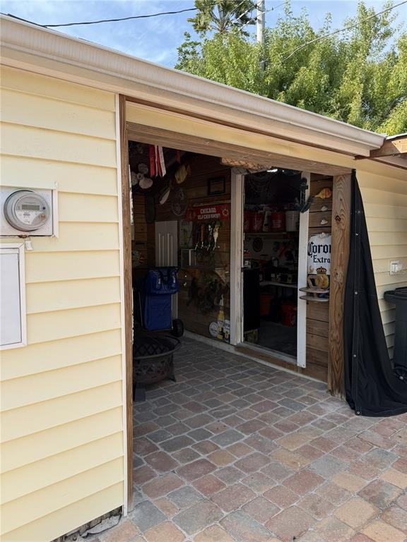 14033 Palm Street Madeira Beach, FL 33708 - Photo 36 of 41 a view of a entryway door of the house