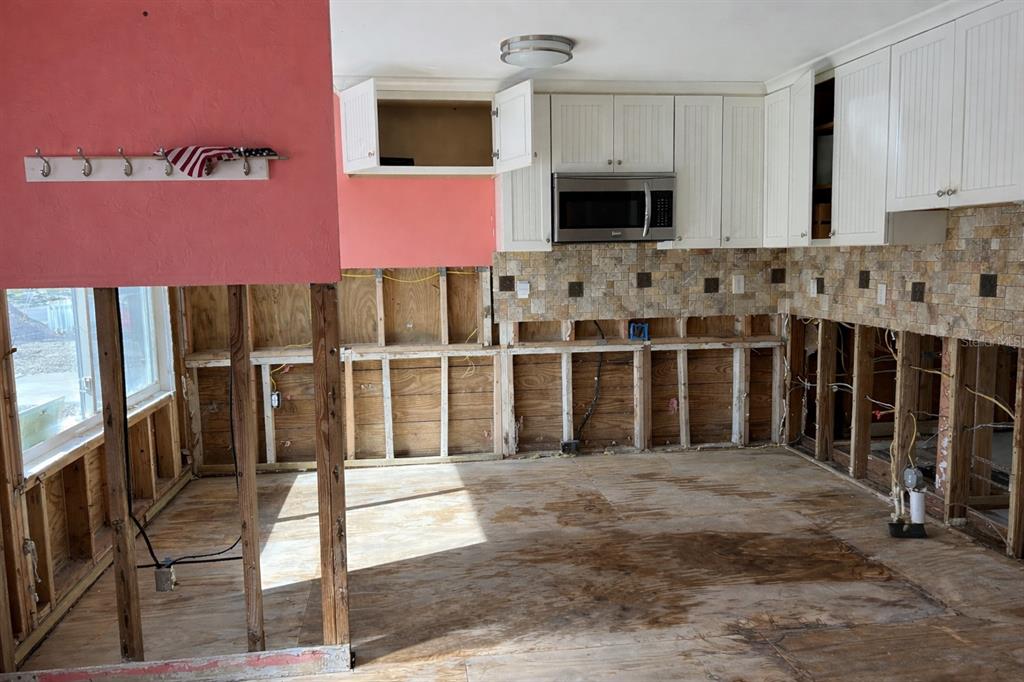 14033 Palm Street Madeira Beach, FL 33708 - Photo 5 of 41 a view of a storage & utility room