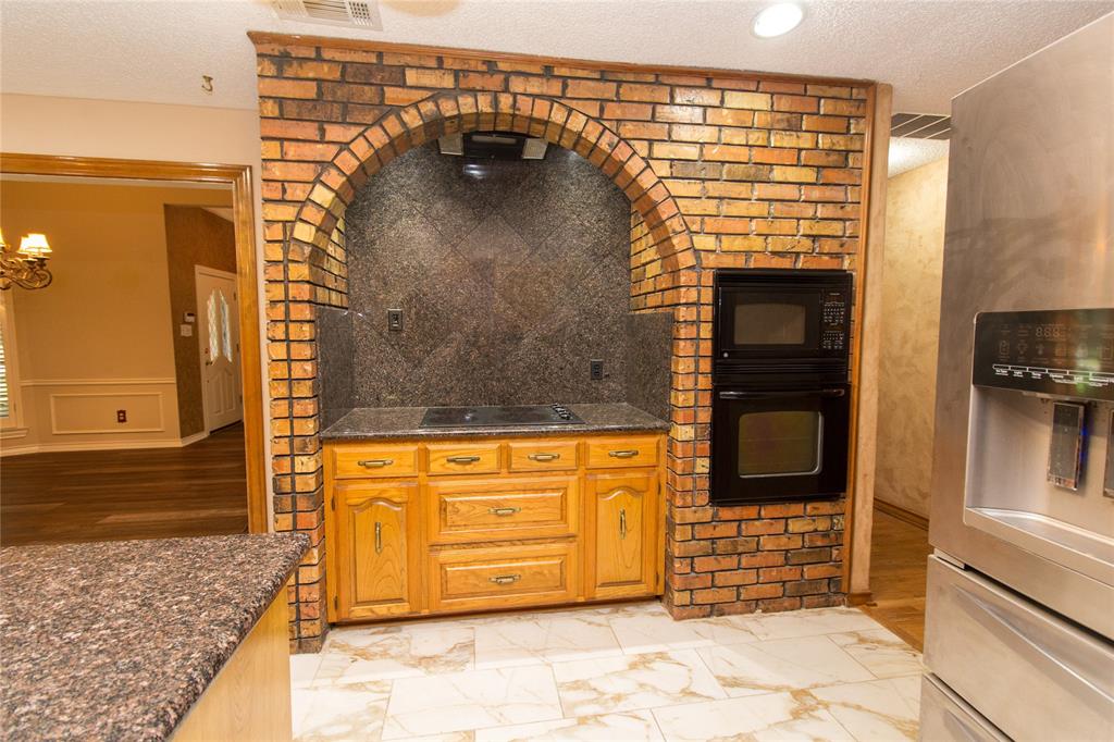 3014 Pecan Ridge Drive Rowlett, TX 75088 - Photo 7 of 29 a view of a entryway door front of a house