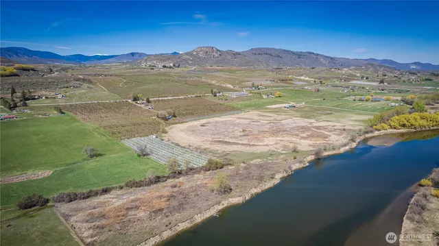 a view of an ocean and a mountain
