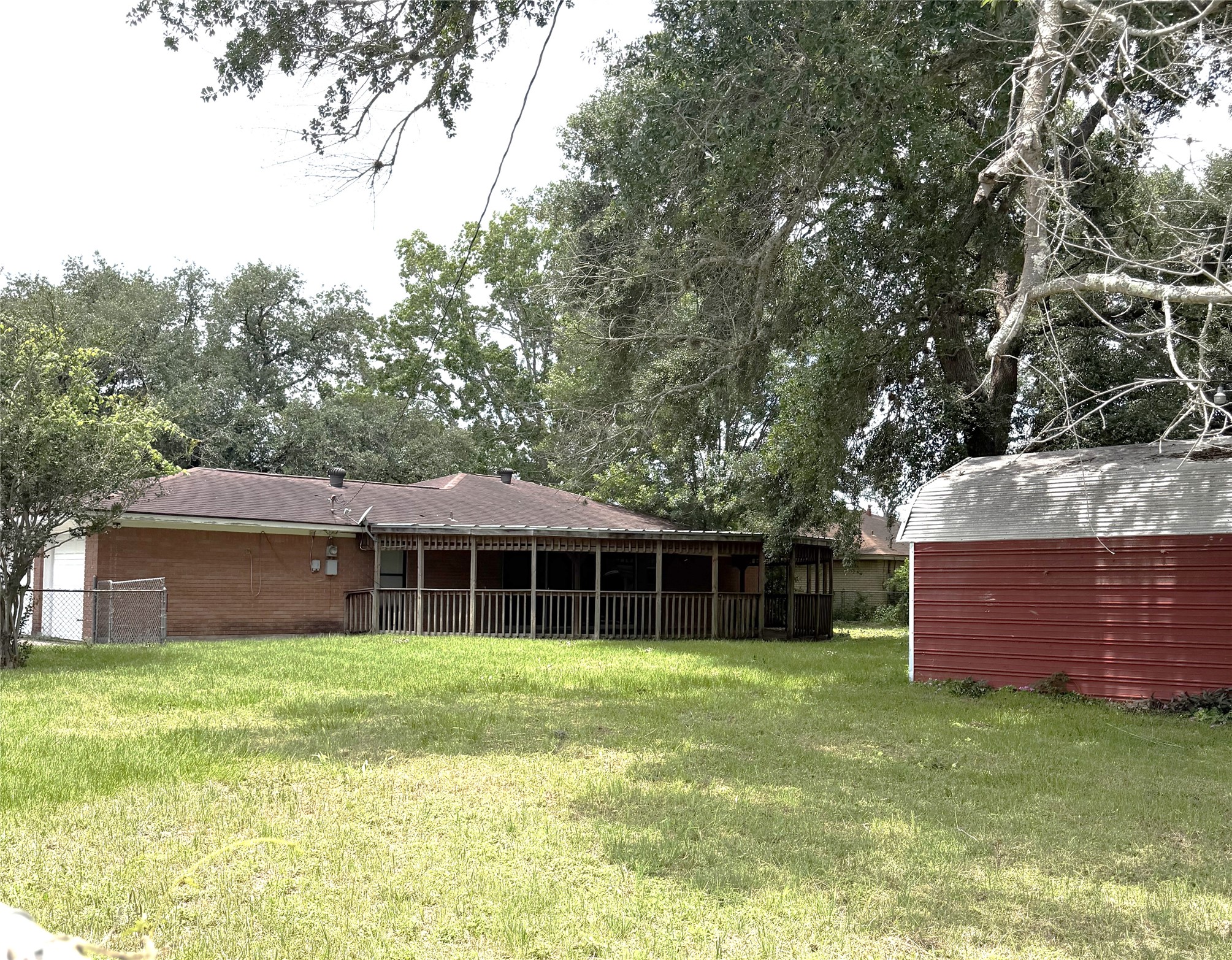1036 8th Street Hempstead, TX 77445 - Photo 24 of 27 back of home with large storage building