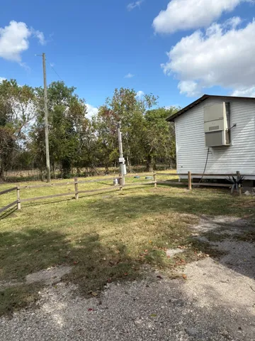 a view of a playground with basketball court