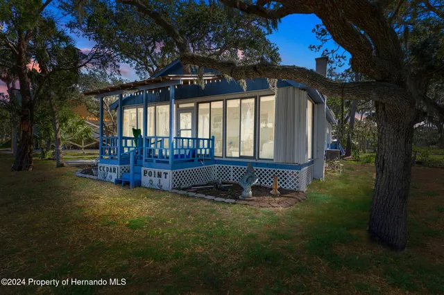 a view of an chairs and table in the patio