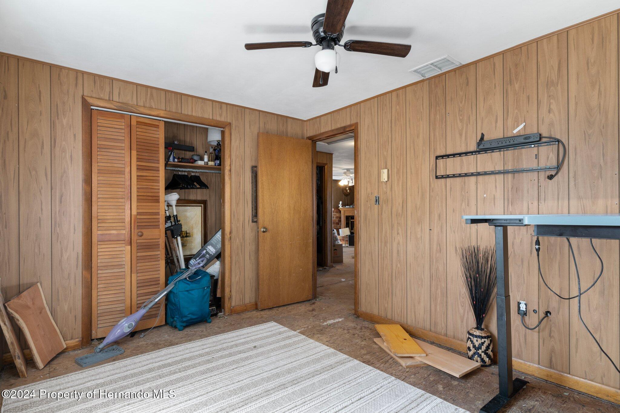 8122 Camp Lane Aripeka, FL 34679 - Photo 32 of 40 a view of an entryway with wooden floor