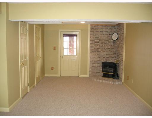275 Randy Lane Coraopolis, PA 15108 - Photo 5 of 5 Den/Family/Great Room. Walk-out from Game room in lower level to back yard. Gas fireplace/stove provides warmth. Powder room in finished lower level.