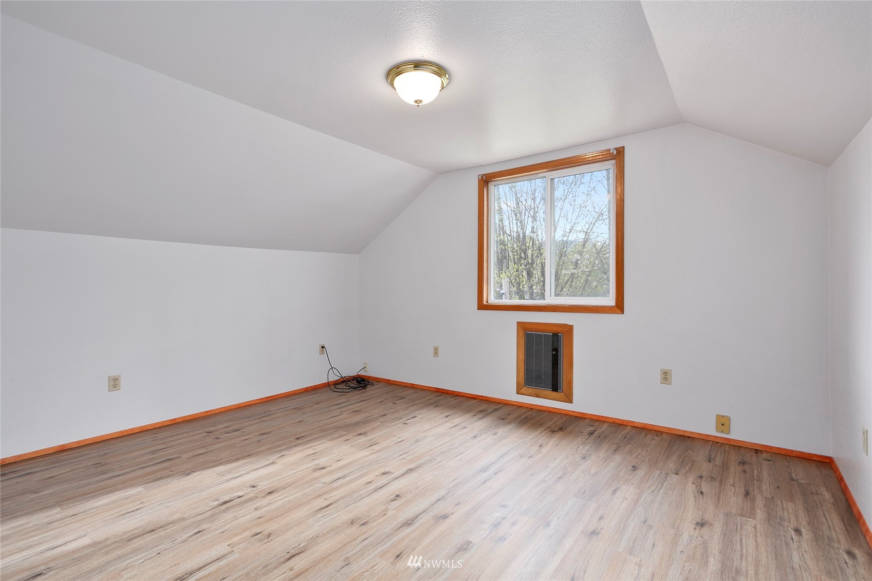 5191 Wickersham Road Acme, WA 98220 - Photo 15 of 23 an empty room with wooden floor and windows