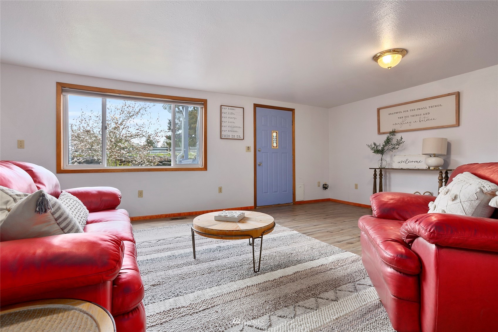 5191 Wickersham Road Acme, WA 98220 - Photo 4 of 23 a living room with furniture a rug and a large window