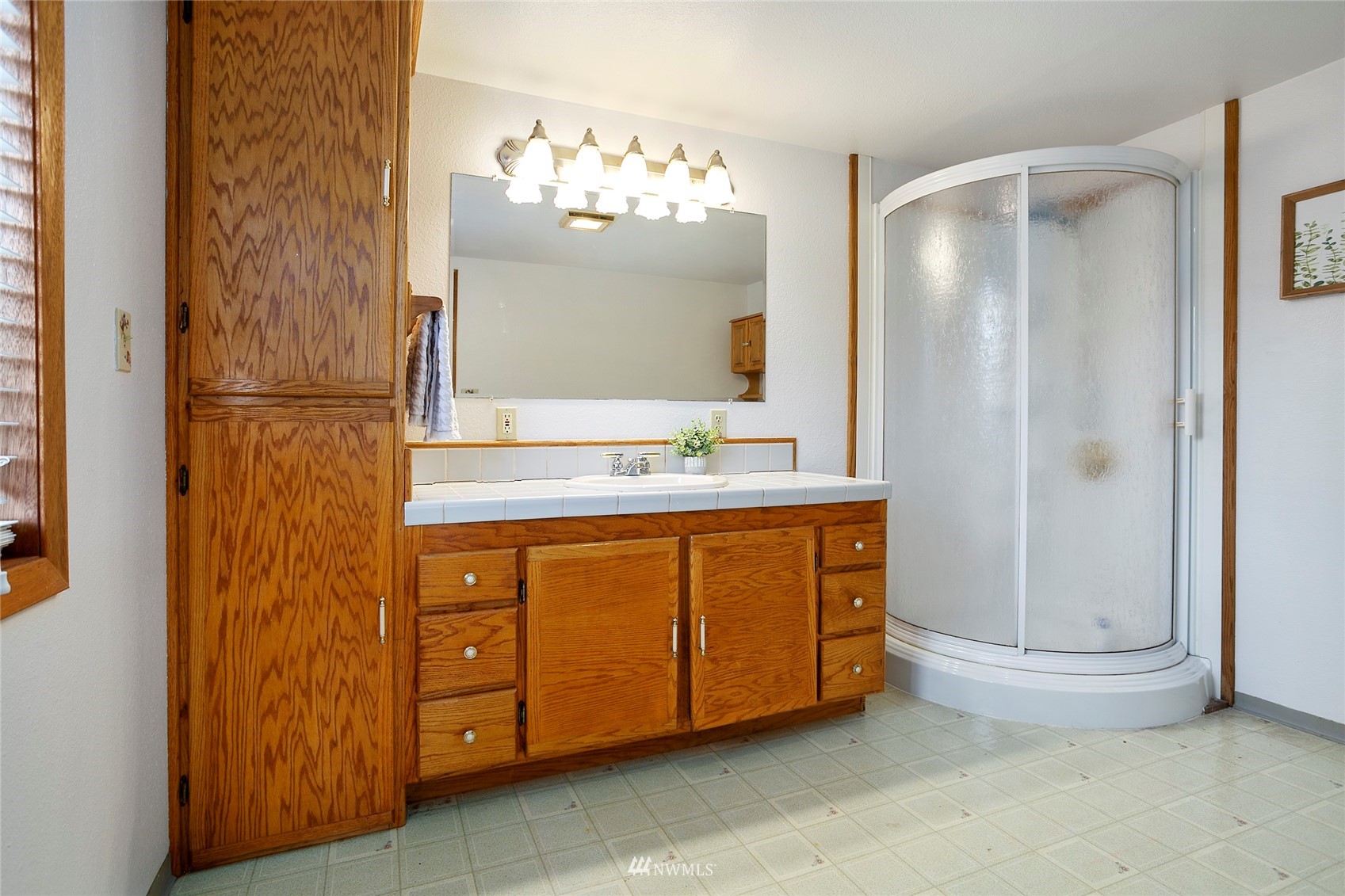 5191 Wickersham Road Acme, WA 98220 - Photo 10 of 23 a bathroom with a double vanity sink and a mirror