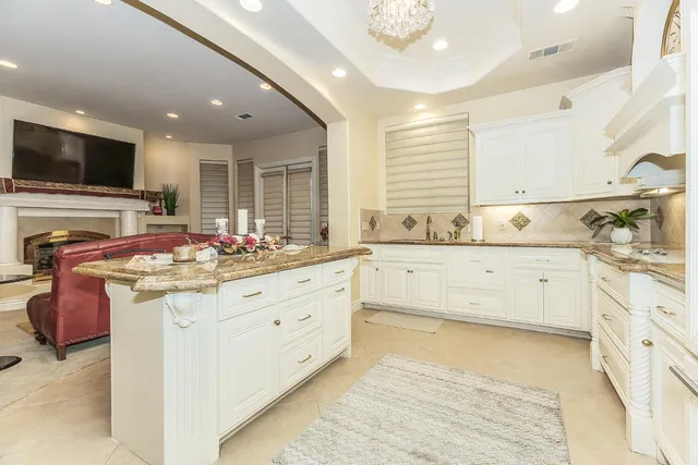 a bathroom with a sink a mirror and a toilet