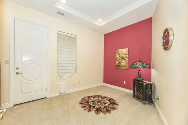 a view of a dining room with furniture wooden floor and chandelier