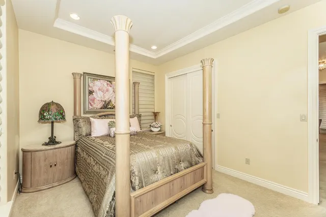 a view of a house with backyard sitting area and garden