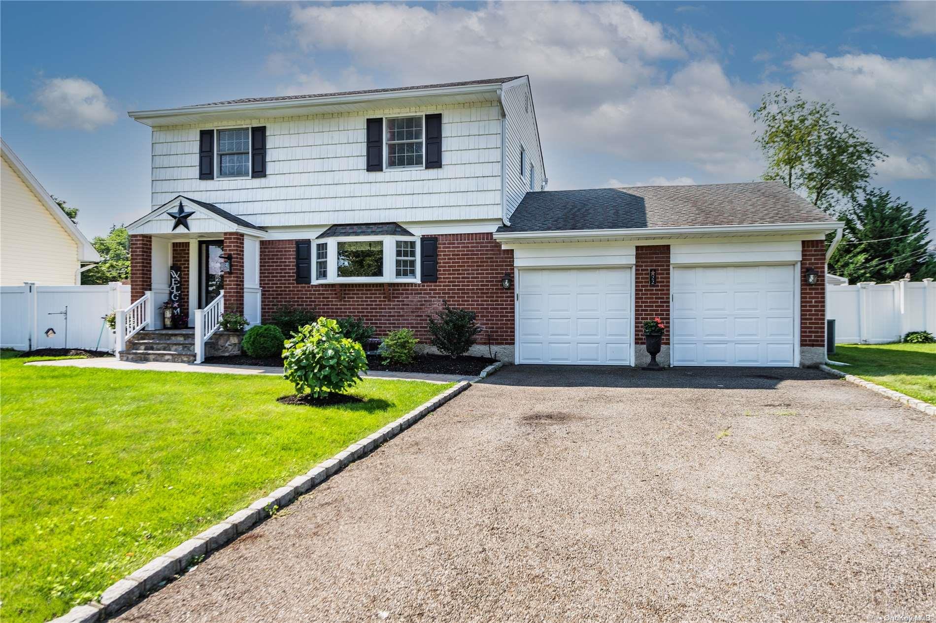 22 Plowboy Path Commack, NY 11725 - Photo 1 of 1 a front view of house with yard