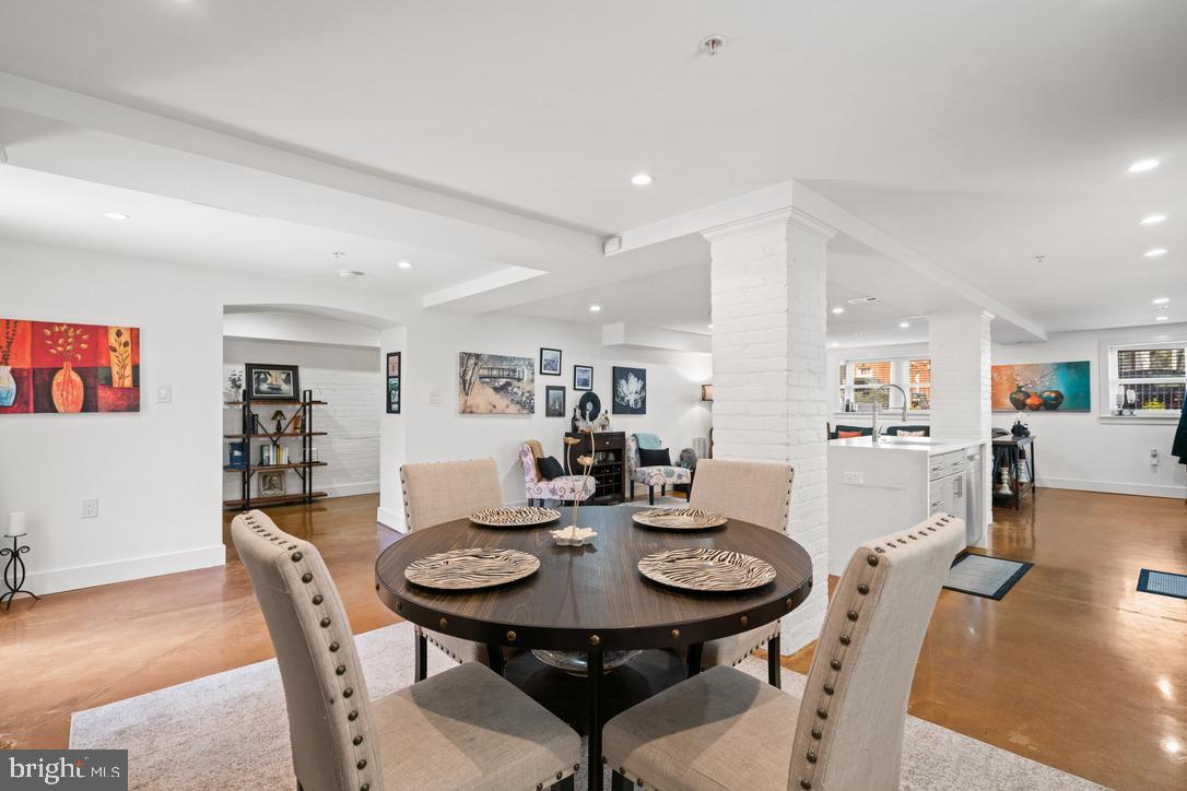 1239 Simms Place Northeast, Unit 5 Washington, DC 20002 - Photo 11 of 31 a view of a dining room with furniture and wooden floor