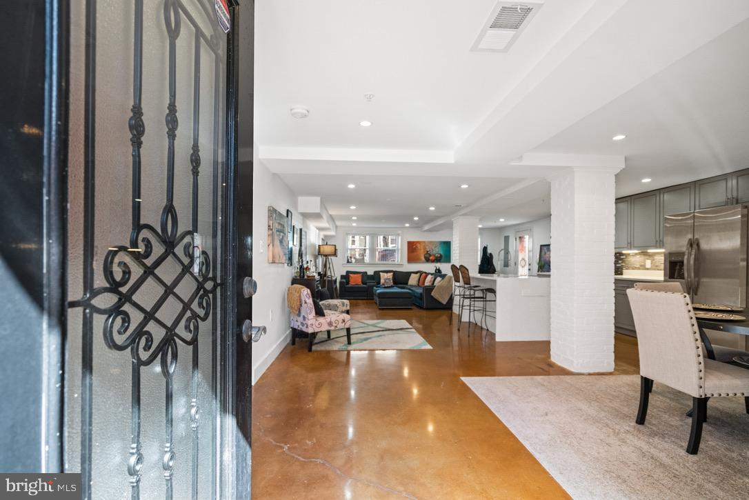1239 Simms Place Northeast, Unit 5 Washington, DC 20002 - Photo 14 of 31 a view of a living room and dining room