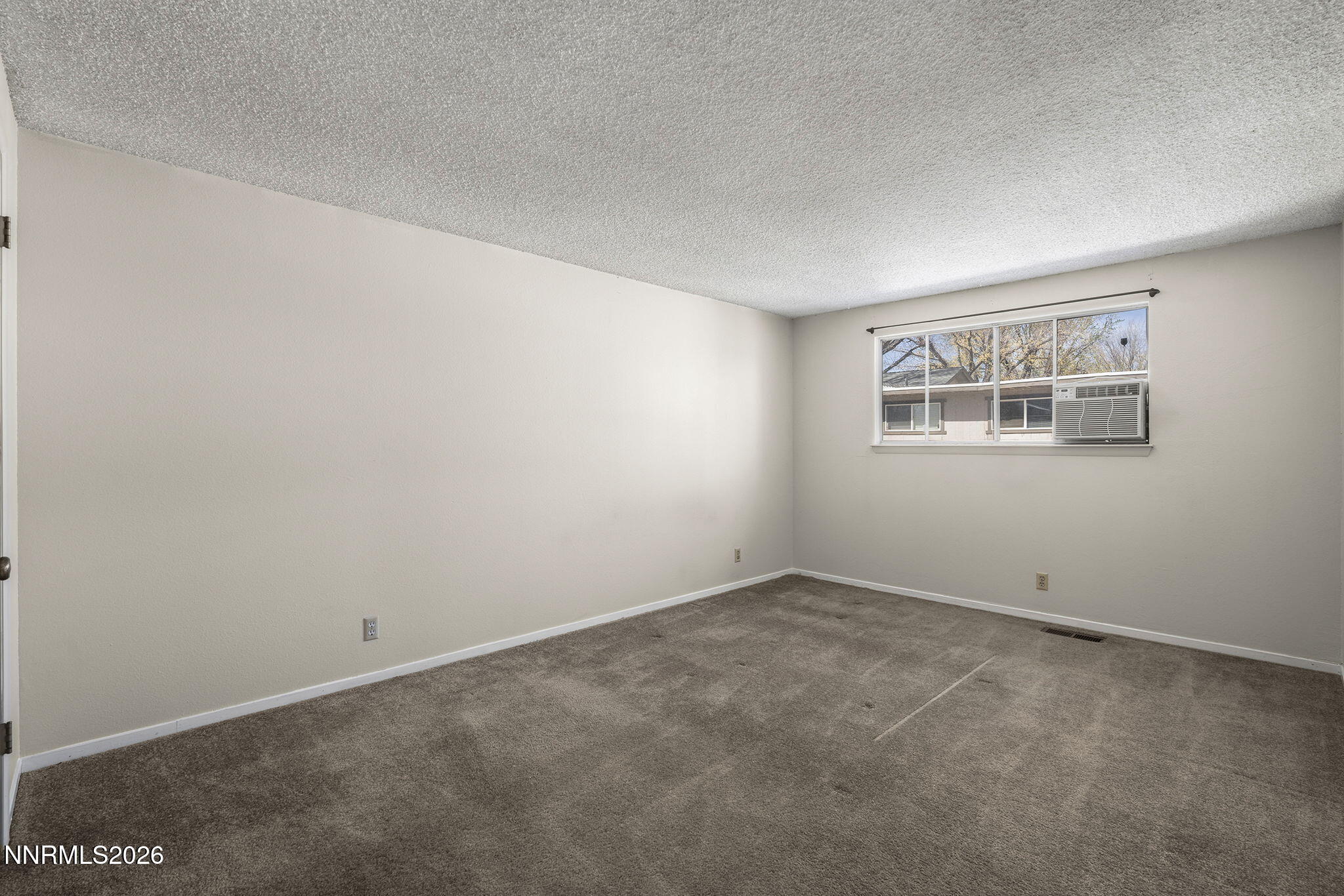2153 Oppio Street Sparks, NV 89431 - Photo 16 of 23 an empty room with windows