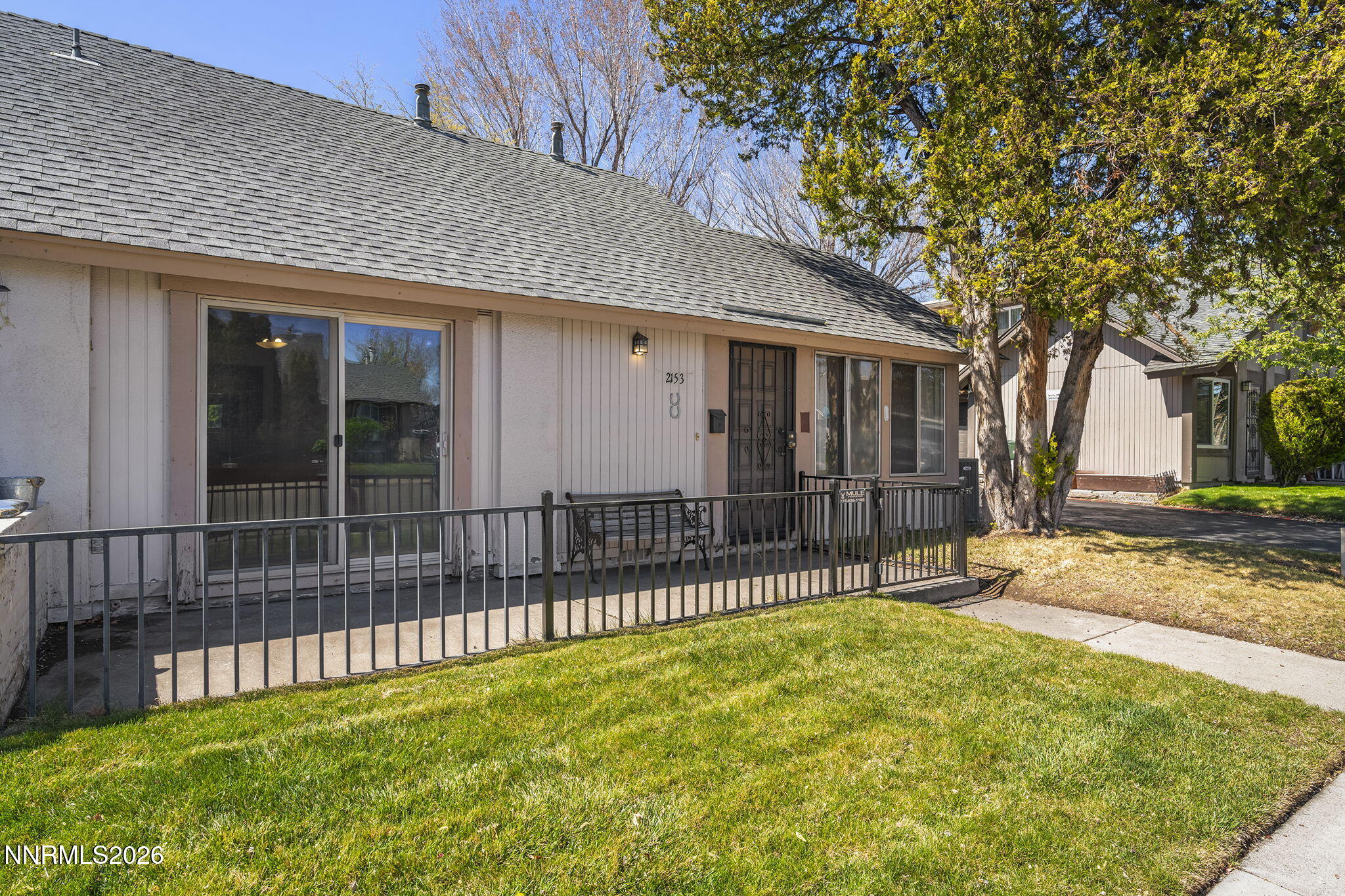 2153 Oppio Street Sparks, NV 89431 - Photo 2 of 23 a view of a house with a backyard and a tree