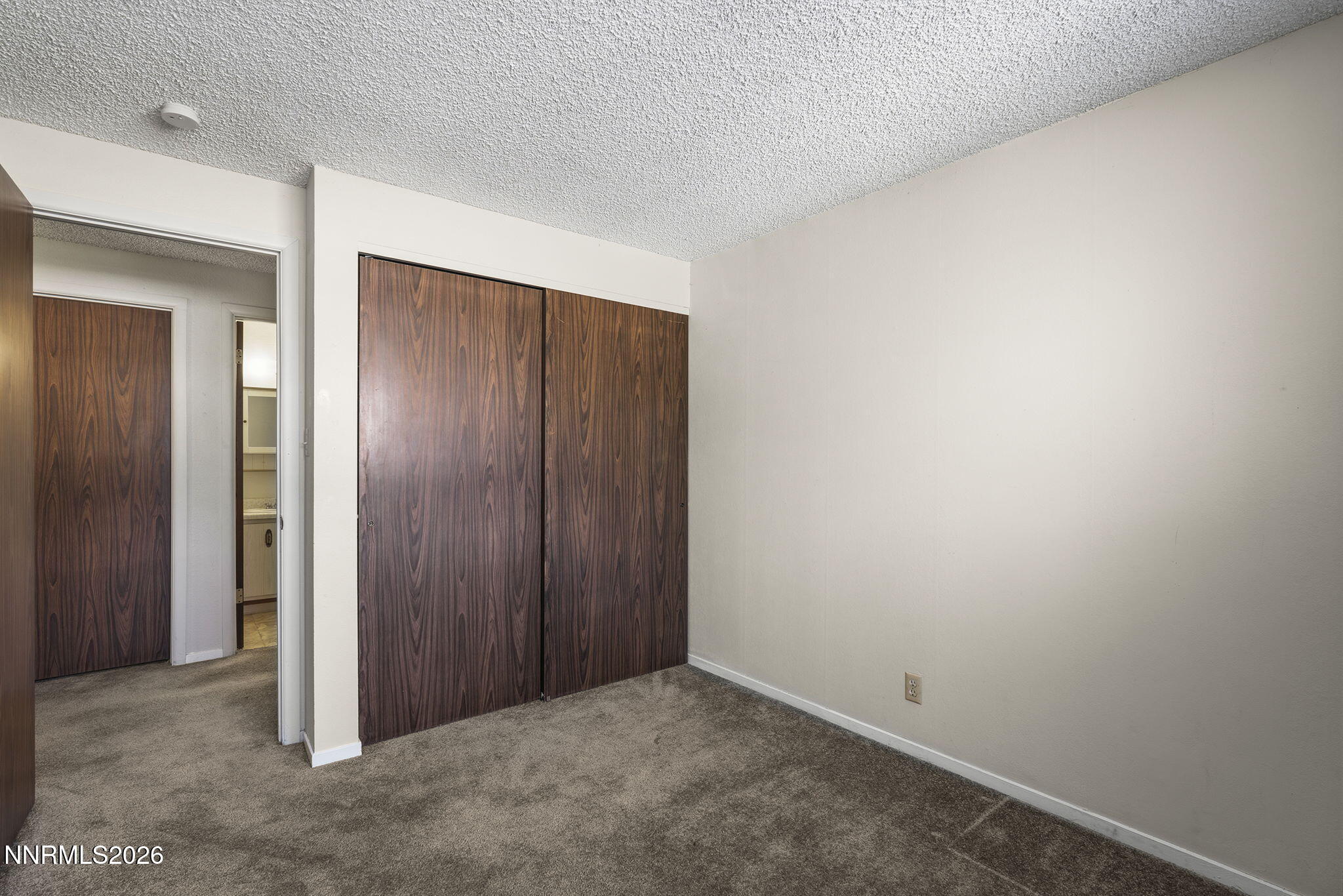 2153 Oppio Street Sparks, NV 89431 - Photo 21 of 23 an empty room with closet area