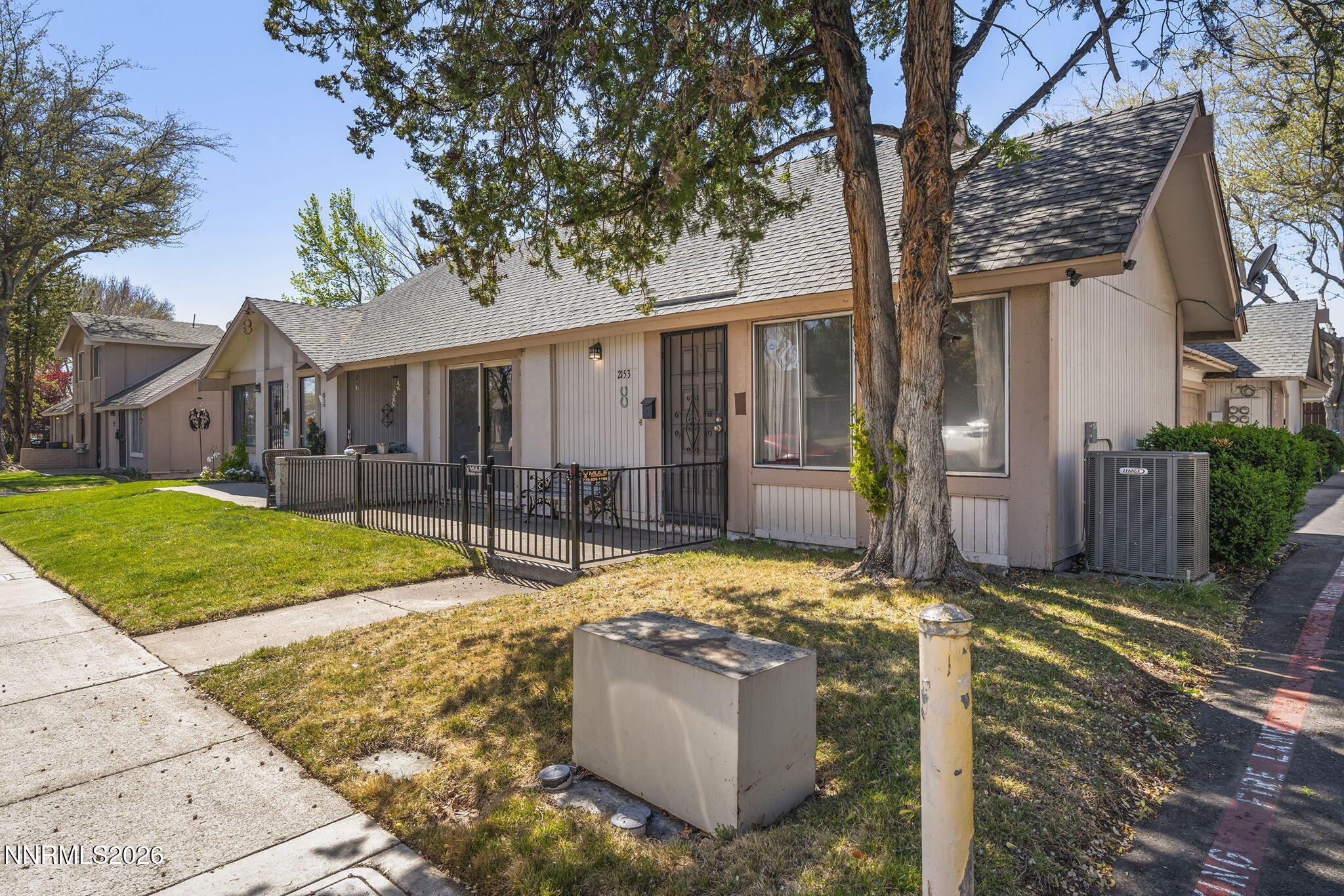 2153 Oppio Street Sparks, NV 89431 - Photo 3 of 23 a view of a house with backyard and tree