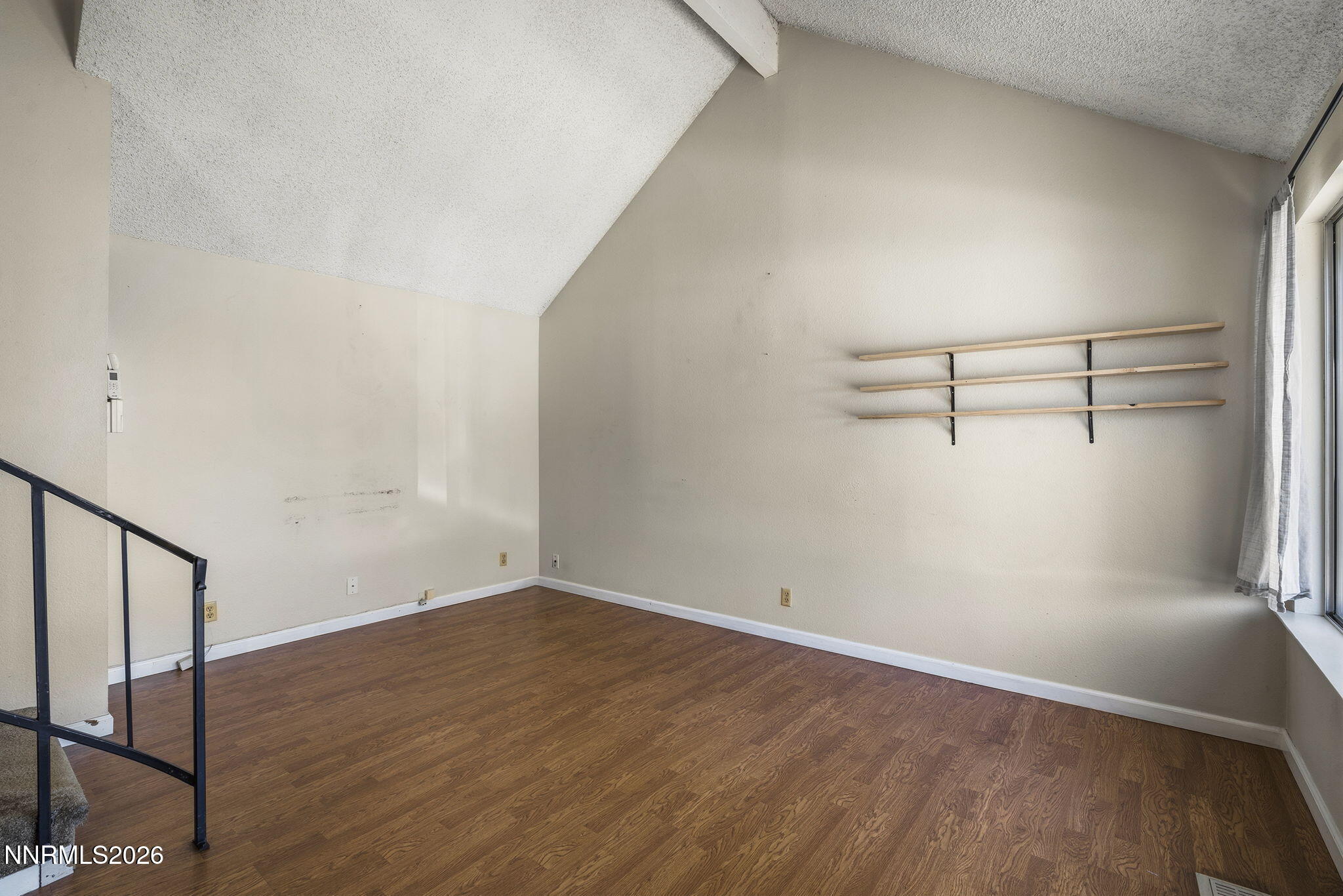 2153 Oppio Street Sparks, NV 89431 - Photo 5 of 23 a view of a room with wooden floor