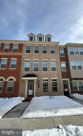 a front view of a multi story residential apartment building