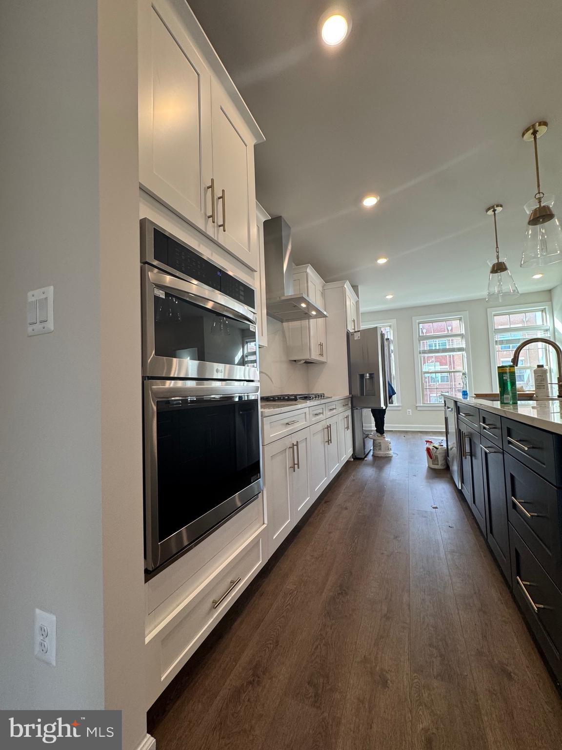 3775 Mayors Way Fairfax, VA 22030 - Photo 31 of 42 a kitchen with stainless steel appliances granite countertop a stove a sink and a microwave