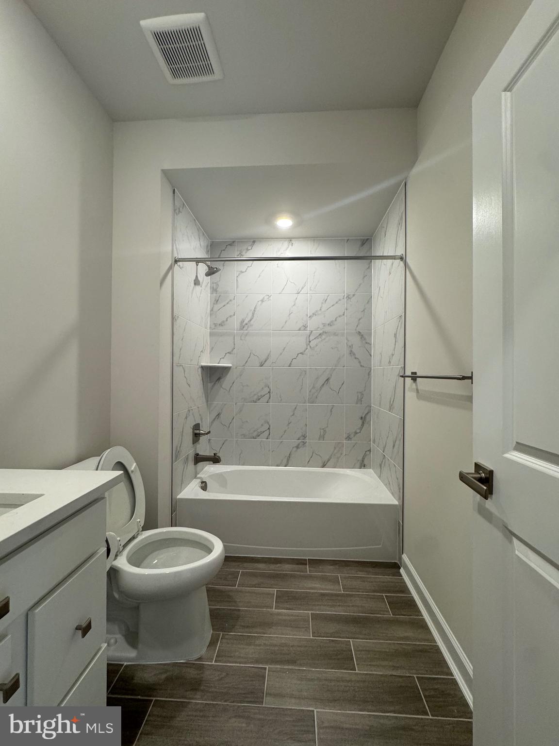 3775 Mayors Way Fairfax, VA 22030 - Photo 7 of 42 a bathroom with a toilet and a bath tub