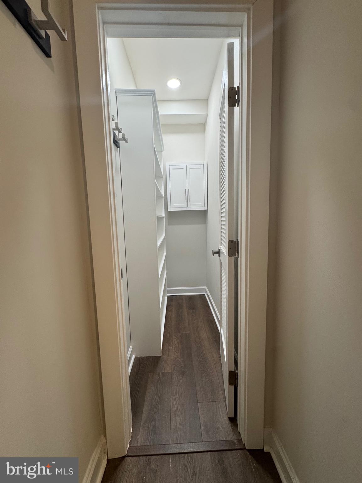 3775 Mayors Way Fairfax, VA 22030 - Photo 8 of 42 a view of a hallway with wooden floor and closet