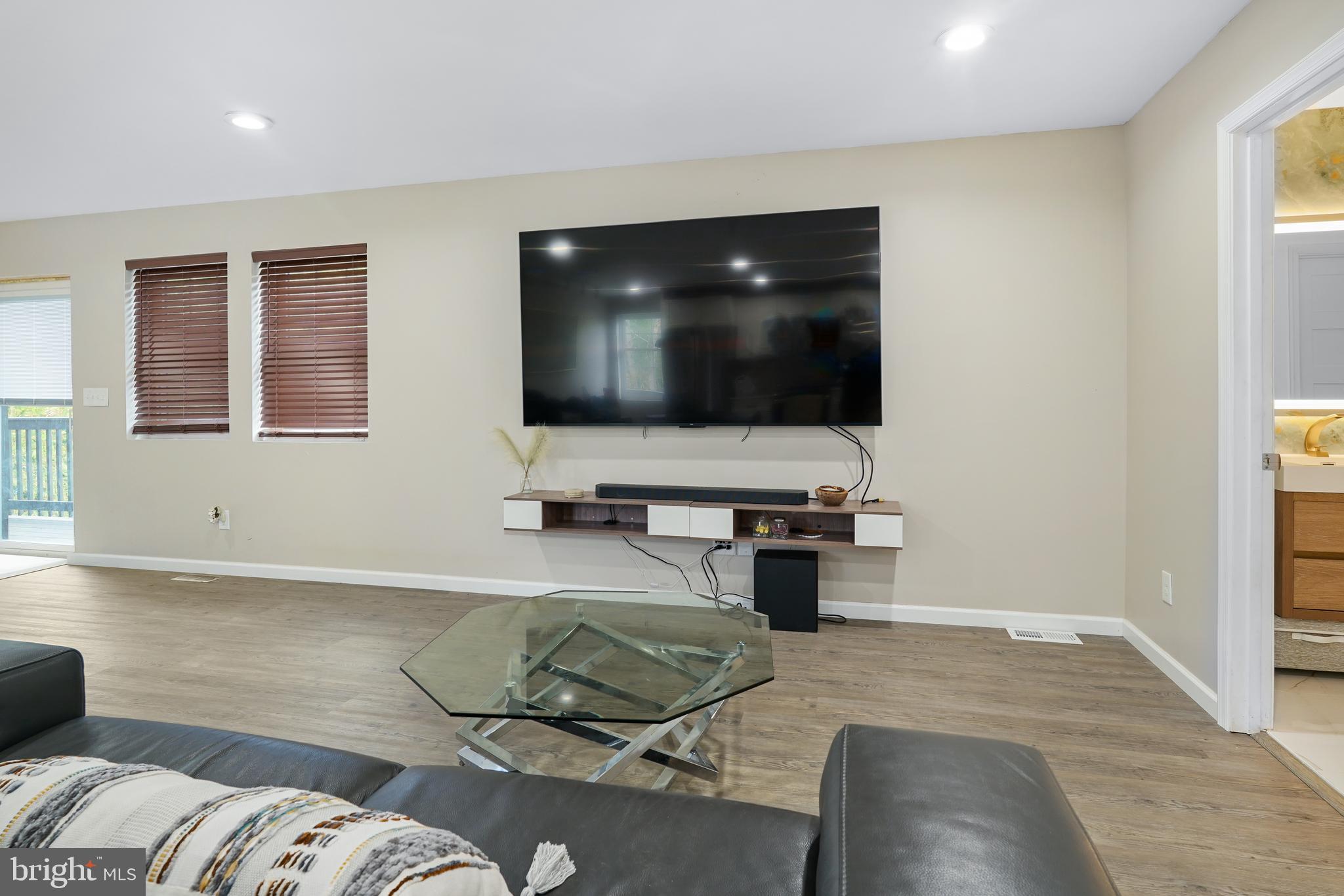 201 Johnstown Road Elkton, MD 21921 - Photo 13 of 84 a living room with furniture and a flat screen tv