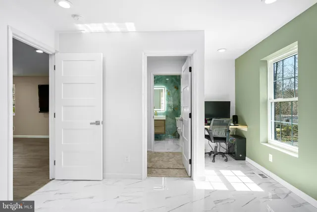 a view of an empty room and window