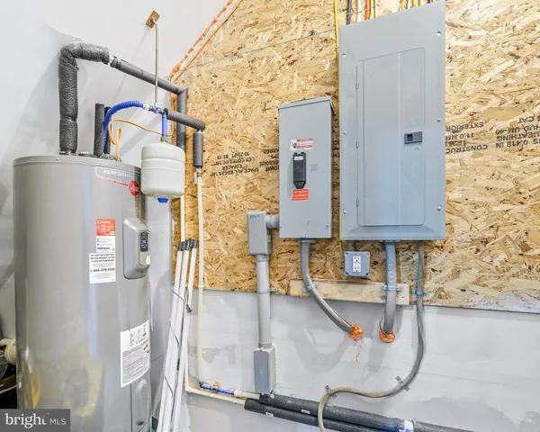 a view of swimming pool with a yard and trees in the background
