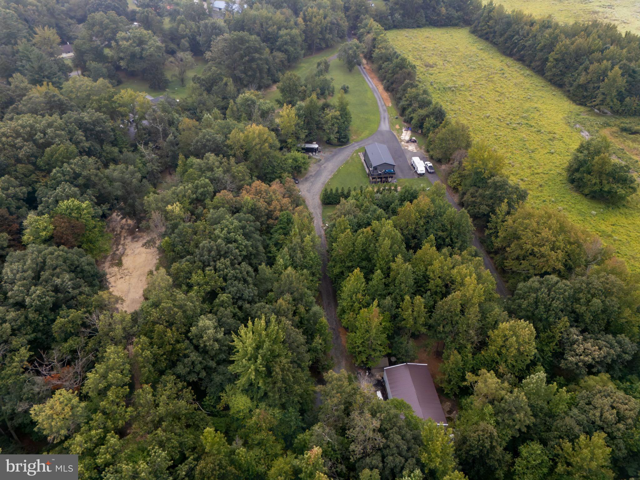 201 Johnstown Road Elkton, MD 21921 - Photo 3 of 84 an aerial view of a house with a yard and lake view