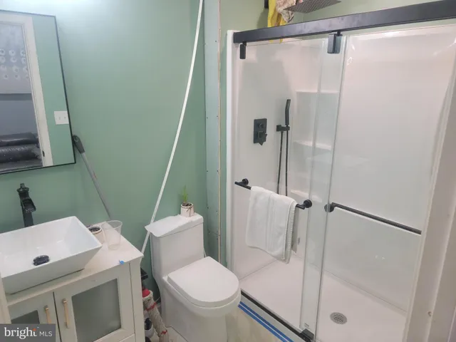 a backyard of a house with lots of green space and trees