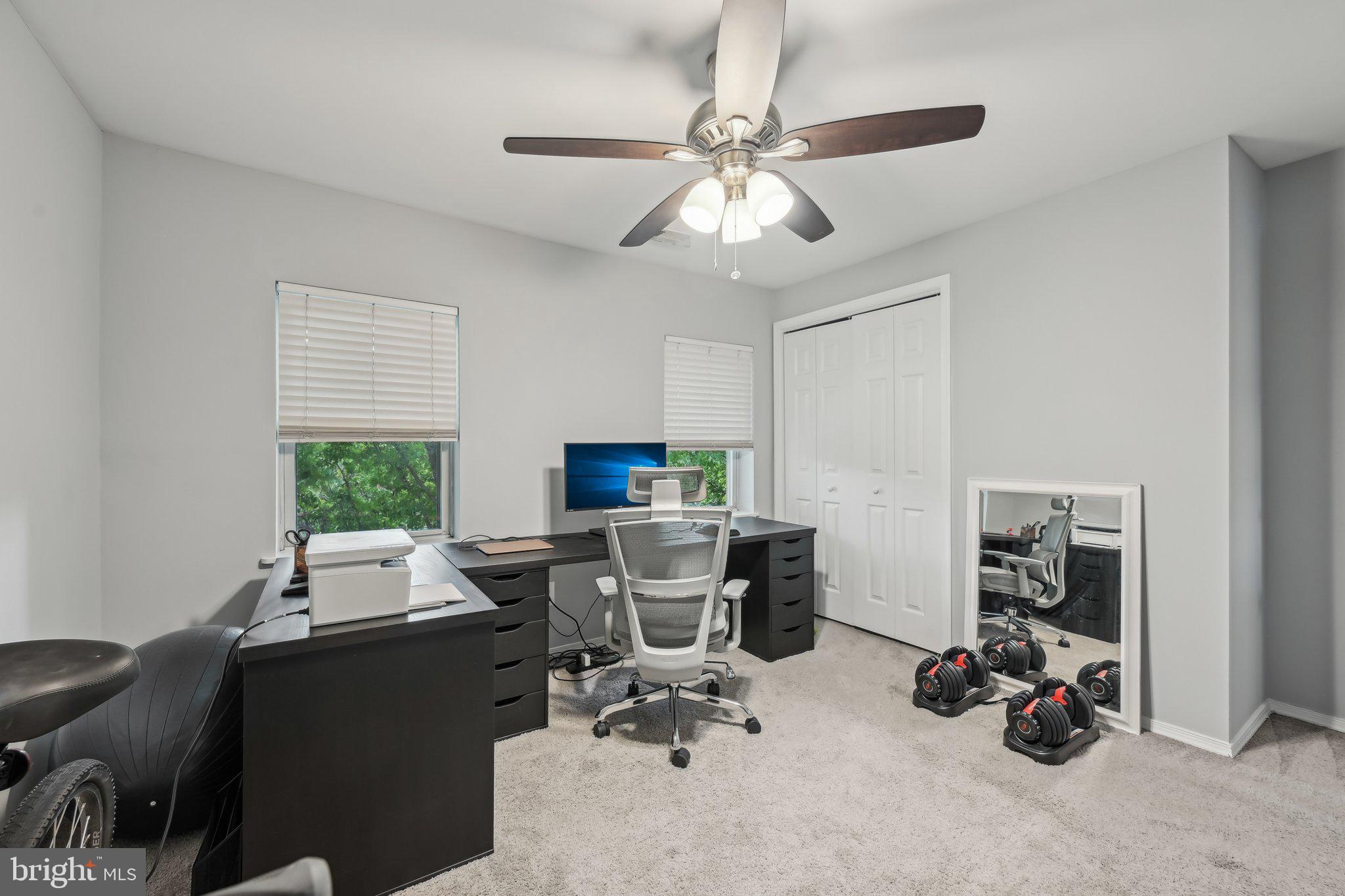 935 South Kenwood Avenue Baltimore, MD 21224 - Photo 21 of 25 a view of a workspace with furniture and a window