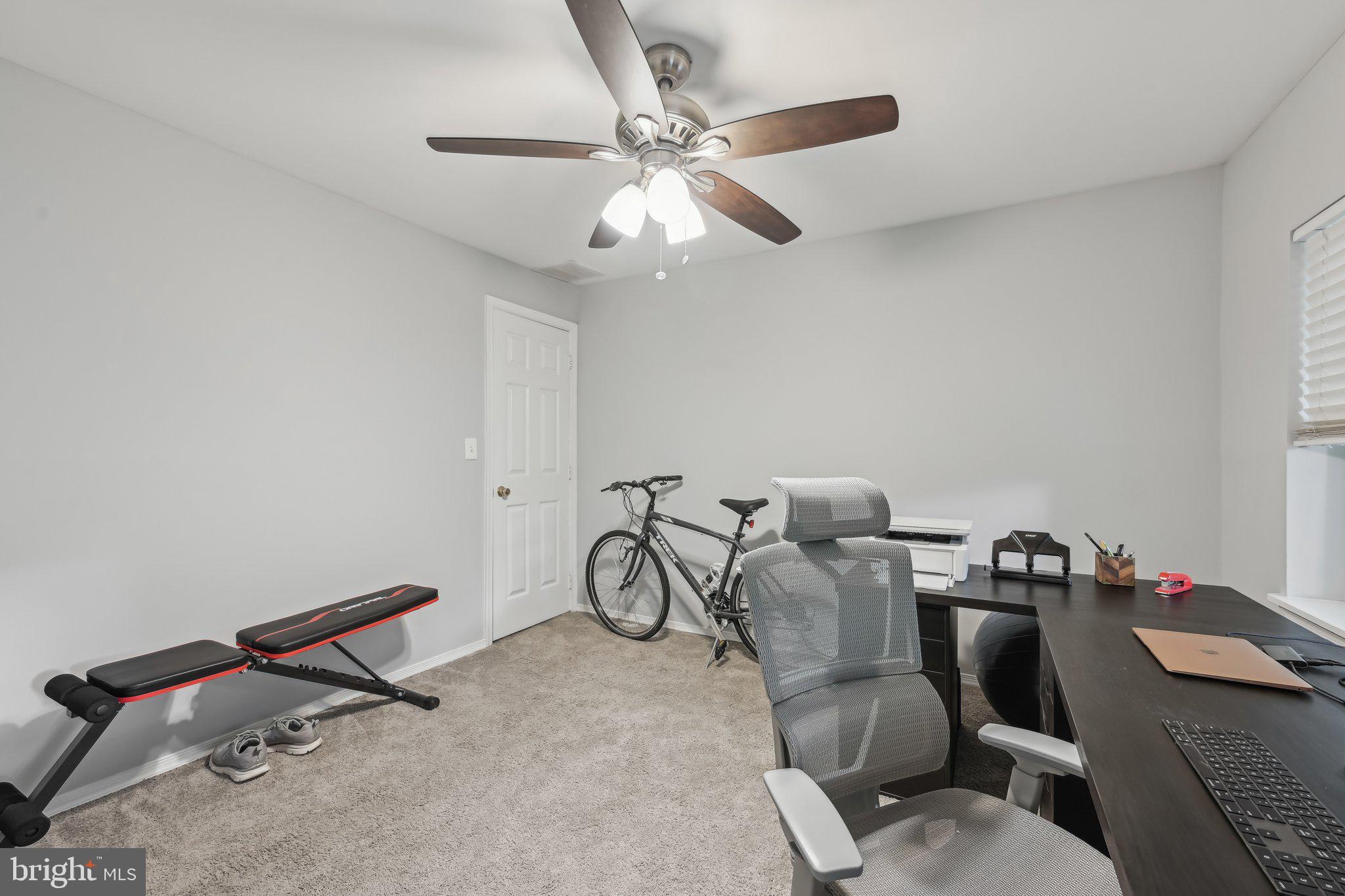 935 South Kenwood Avenue Baltimore, MD 21224 - Photo 22 of 25 a view of a room with gym equipment
