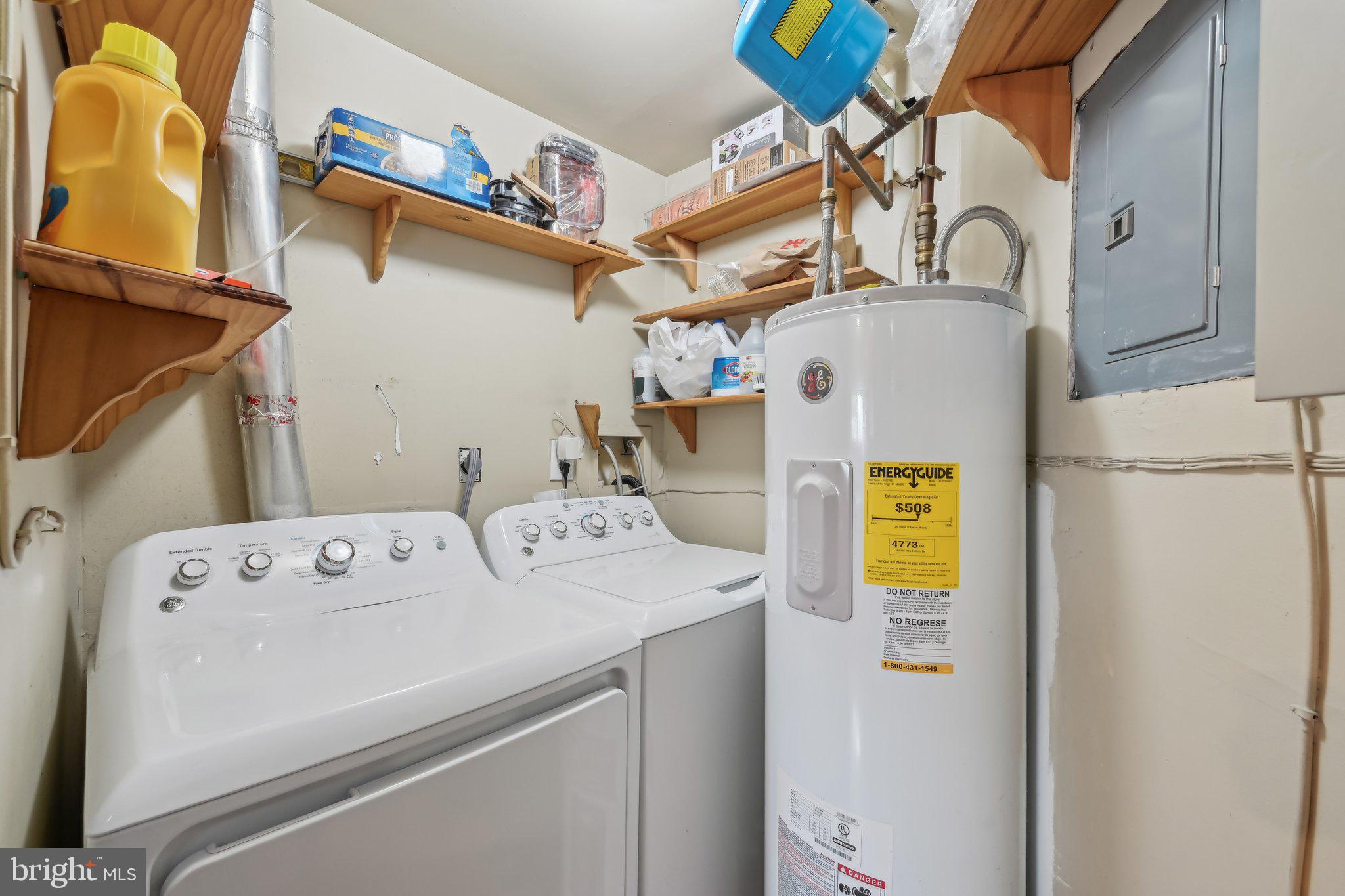 935 South Kenwood Avenue Baltimore, MD 21224 - Photo 23 of 25 a utility room with dryer and washer