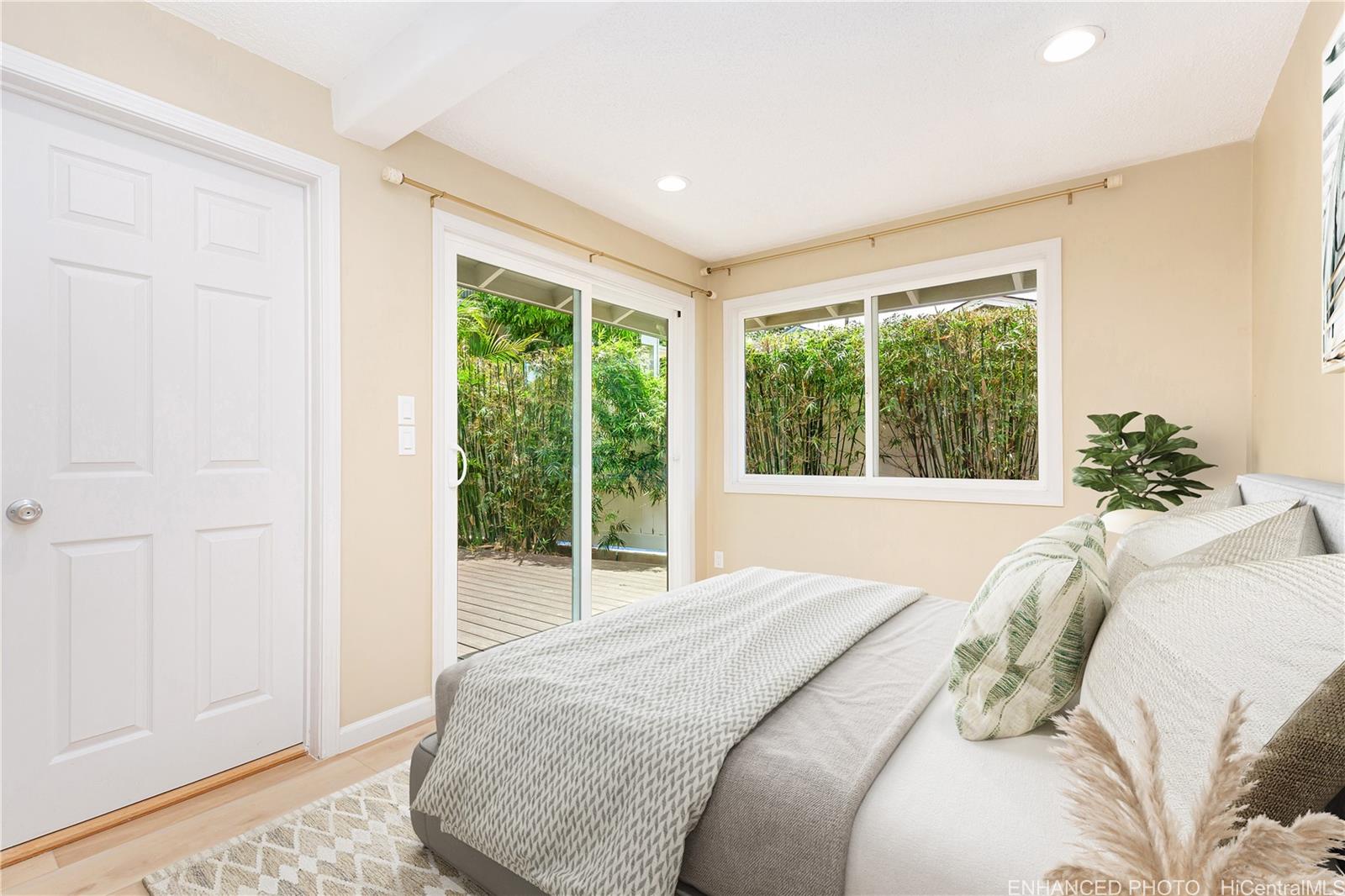 1898 Iwi Way Honolulu, HI 96816 - Photo 6 of 25 a bedroom with a bed and a window