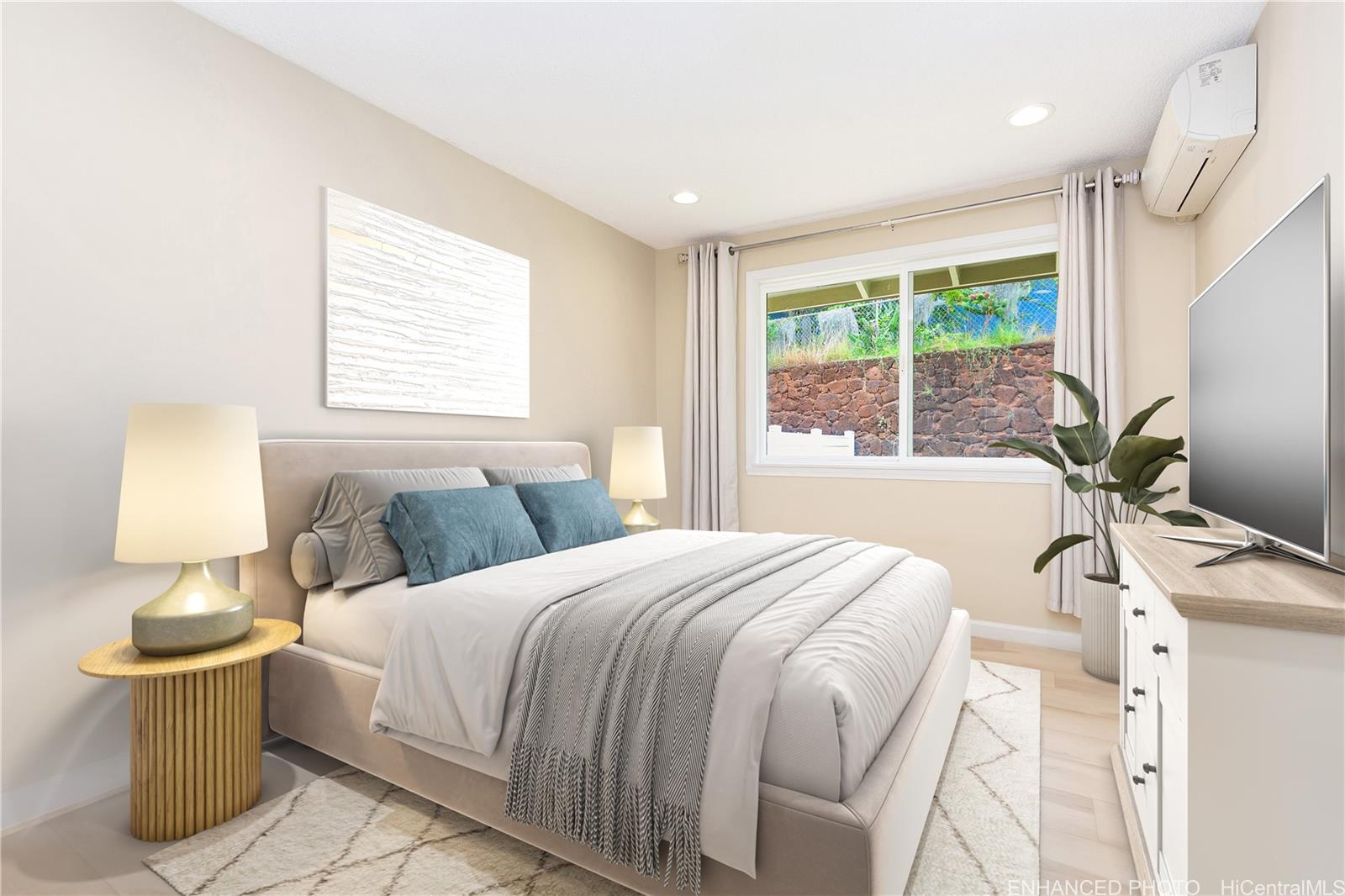 1898 Iwi Way Honolulu, HI 96816 - Photo 7 of 25 a bedroom with a bed and large window