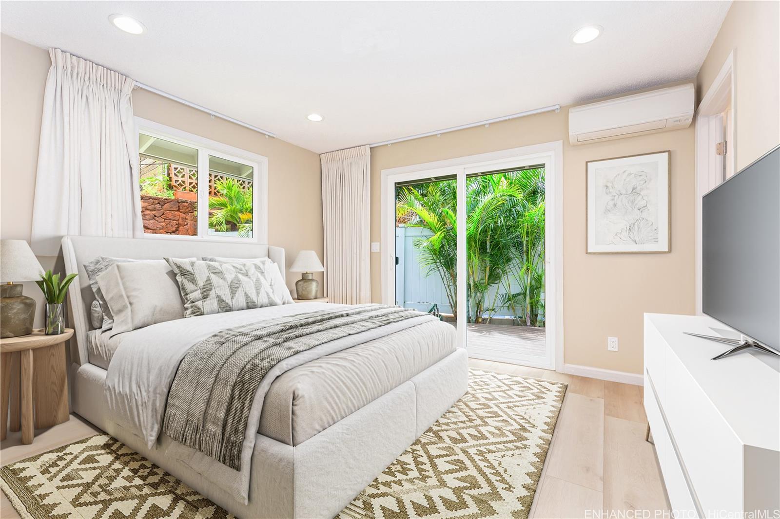 1898 Iwi Way Honolulu, HI 96816 - Photo 9 of 25 a bedroom with a large bed and a window