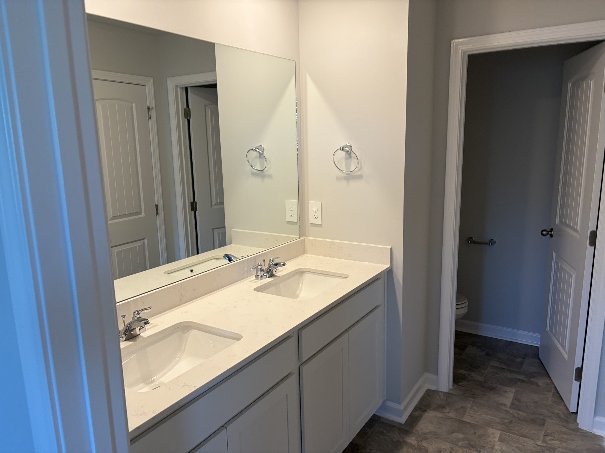 1011 Keyes Place Lebanon, TN 37087 - Photo 6 of 9 a bathroom with a granite countertop sink and a mirror