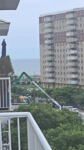 a view of a garden from a balcony
