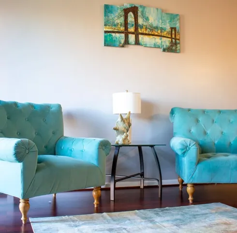 a living room with furniture and a couch