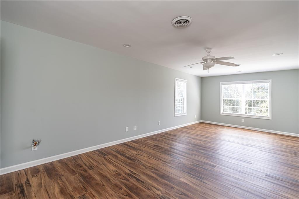 113 Warwick Way Rome, GA 30161 - Photo 33 of 49 a view of an empty room with wooden floor and a window