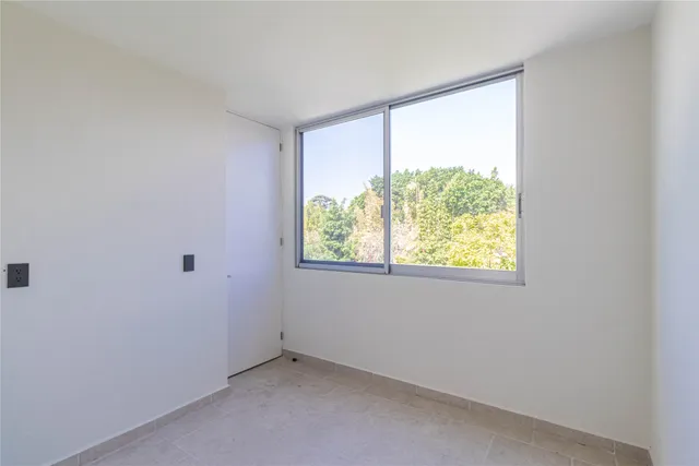 an empty room with a window